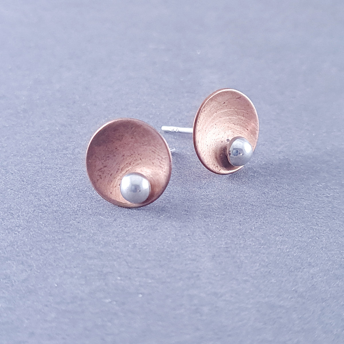 D1/10061 Copper and silver earring